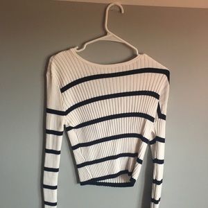 A beautiful warm white sweater with black stripes